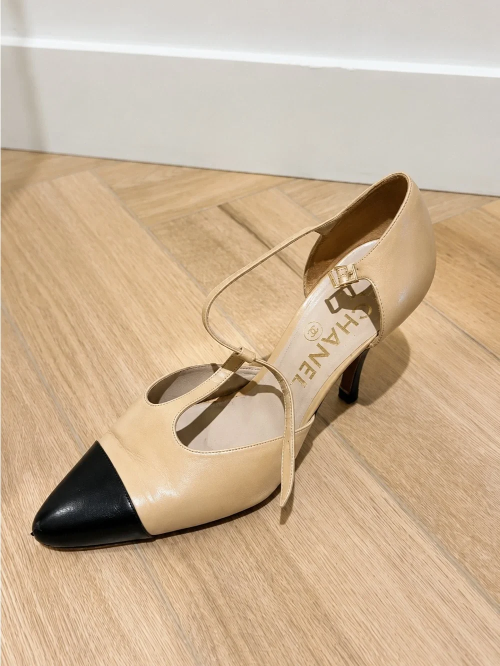 CHANEL Beige and Black Cap-Toe Slingback Heels